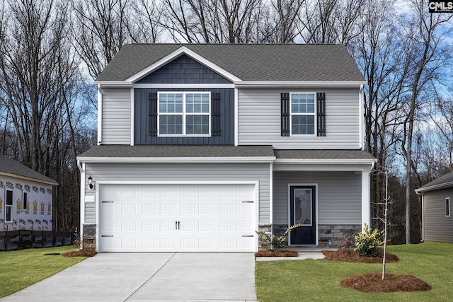 1037 Peaceful Fawn Dr, Elgin, SC 29045 - view of front facade with an attached garage, concrete driveway, stone siding, a front lawn, and roof with shingles
