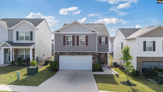 2109 Elmridge Rd, Columbia, SC 29209 - view of front facade with stone siding, a garage, driveway, a front yard, and cooling unit
