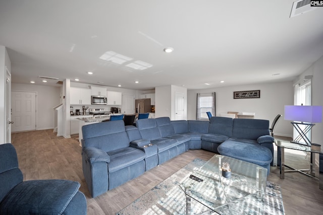 2109 Elmridge Rd, Columbia, SC 29209 - living area with light wood-style flooring, recessed lighting, and baseboards