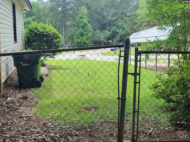 view of yard with a gate