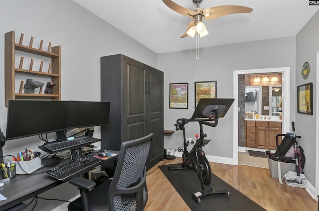 1320 Pulaski St Unit B207, Columbia, SC 29201 - home office featuring ceiling fan, light wood-type flooring, and baseboards