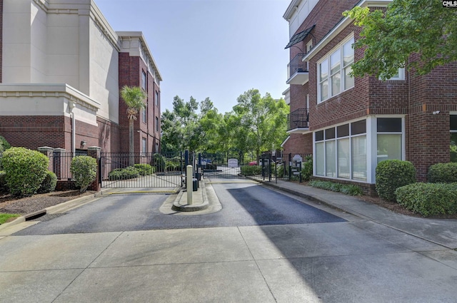 1320 Pulaski St Unit B207, Columbia, SC 29201 - view of concrete street featuring a gate, a gated entry, and curbs