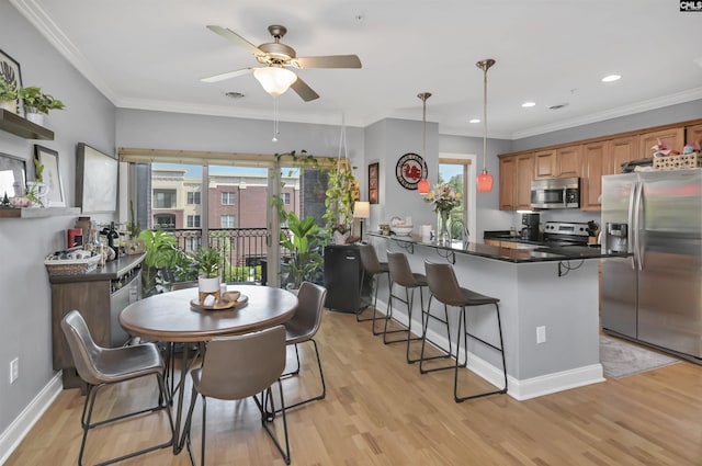 1320 Pulaski St Unit B207, Columbia, SC 29201 - dining area with plenty of natural light, a ceiling fan, light wood-style flooring, baseboards, and recessed lighting