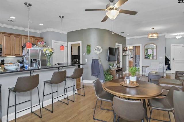 1320 Pulaski St Unit B207, Columbia, SC 29201 - dining area featuring a ceiling fan, light wood finished floors, baseboards, recessed lighting, and ornamental molding