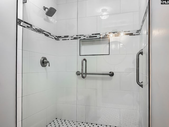 full bathroom featuring a stall shower