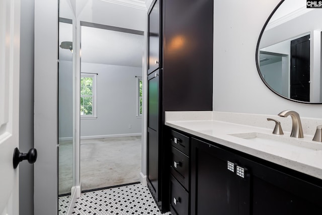 bathroom featuring vanity and baseboards