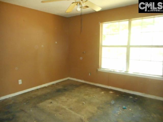 2133 Slighs Ave, Columbia, SC 29204 - empty room featuring baseboards and ceiling fan