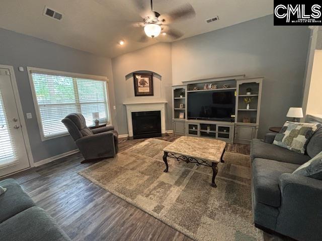 404 Coopers Edge Ln, Blythewood, SC 29016 - living area featuring a ceiling fan, wood finished floors, a fireplace, baseboards, and lofted ceiling