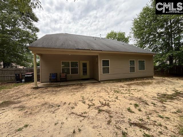 404 Coopers Edge Ln, Blythewood, SC 29016 - back of house with fence and a patio
