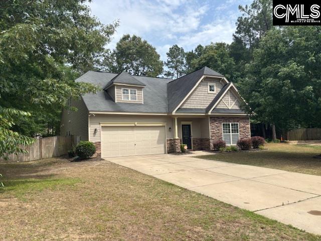 404 Coopers Edge Ln, Blythewood, SC 29016 - craftsman house with stone siding, concrete driveway, and a garage