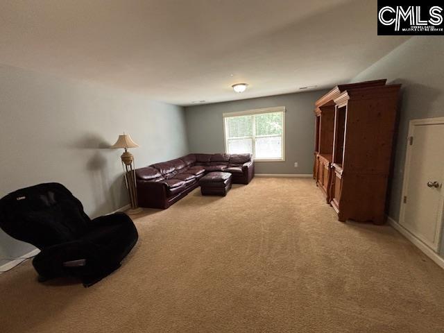 404 Coopers Edge Ln, Blythewood, SC 29016 - living room featuring light colored carpet and baseboards