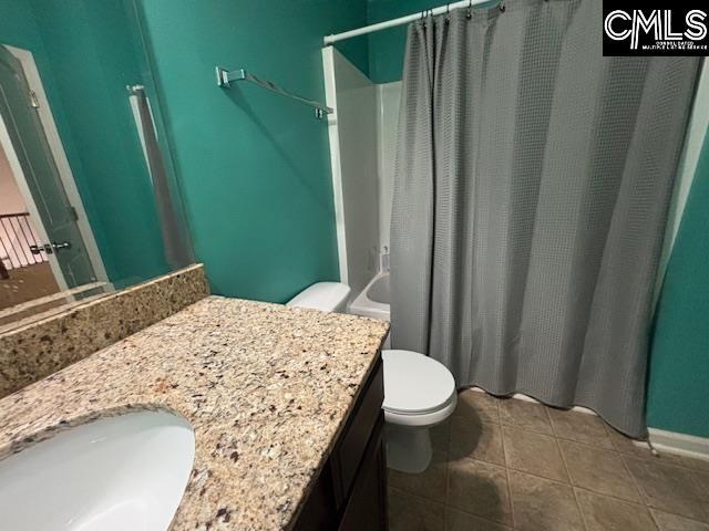 404 Coopers Edge Ln, Blythewood, SC 29016 - full bathroom with vanity, toilet, tile patterned floors, and a shower with shower curtain