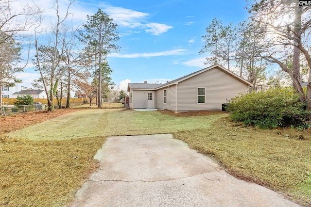 back of property with driveway