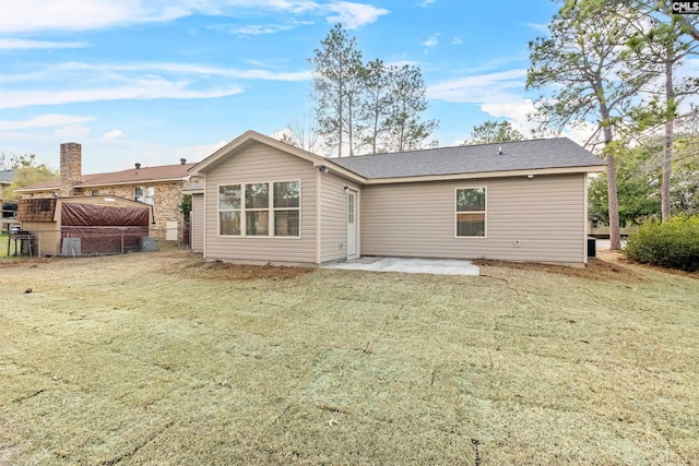 rear view of house featuring a patio area
