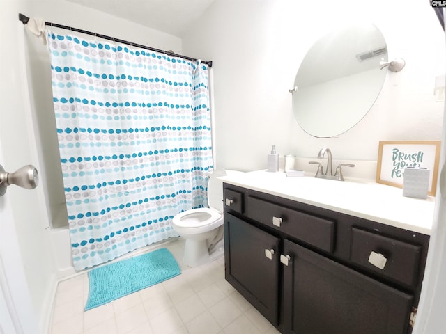 full bathroom featuring toilet and vanity