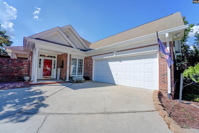 412 White Birch Cir, Columbia, SC 29223 - view of front of home featuring brick siding, concrete driveway, and an attached garage