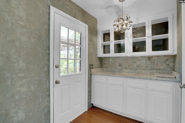 731 Trafalgar Dr, Columbia, SC 29210 - entryway with a chandelier, healthy amount of natural light, and wood finished floors
