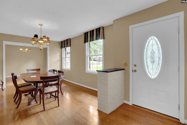 731 Trafalgar Dr, Columbia, SC 29210 - dining area featuring baseboards, a chandelier, and light wood finished floors