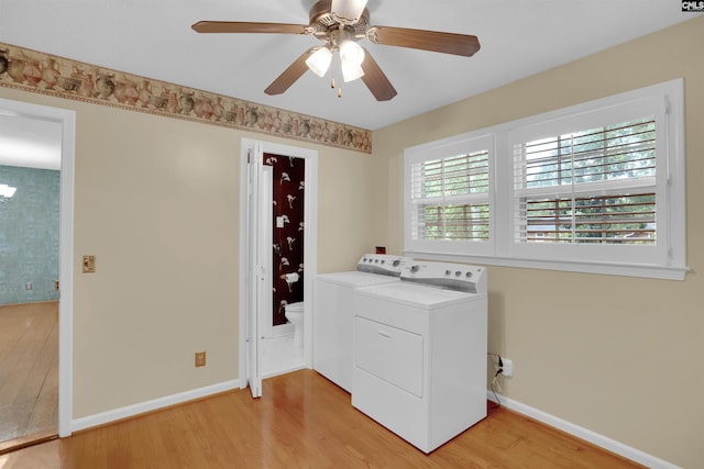 731 Trafalgar Dr, Columbia, SC 29210 - laundry room with light wood-type flooring, washer and dryer, ceiling fan, and baseboards