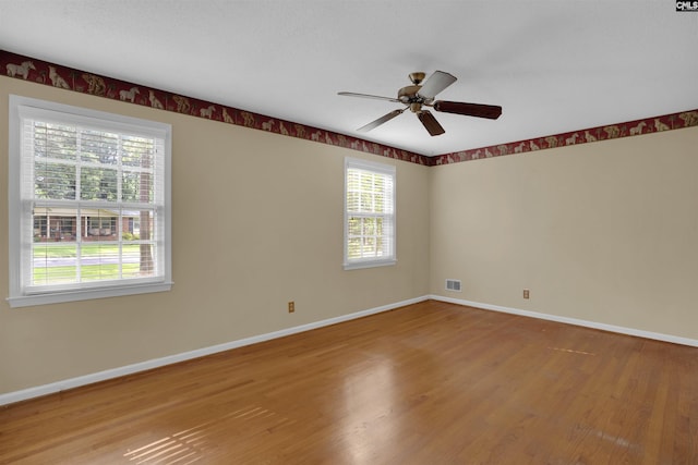 731 Trafalgar Dr, Columbia, SC 29210 - spare room with plenty of natural light, wood finished floors, and a ceiling fan