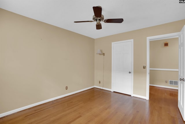 731 Trafalgar Dr, Columbia, SC 29210 - unfurnished bedroom featuring wood finished floors, baseboards, and a ceiling fan