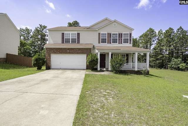 traditional-style home with covered porch, driveway, a garage, and brick siding
