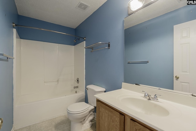 full bathroom featuring toilet, a textured ceiling, vanity, and shower / bathtub combination