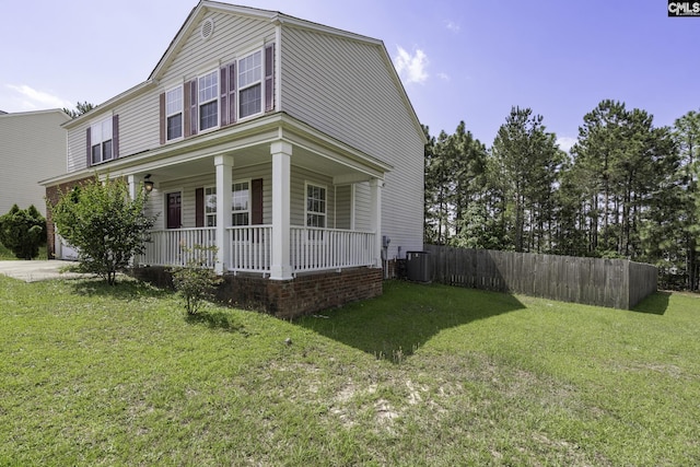 view of property exterior featuring a porch, central AC unit, and a garage