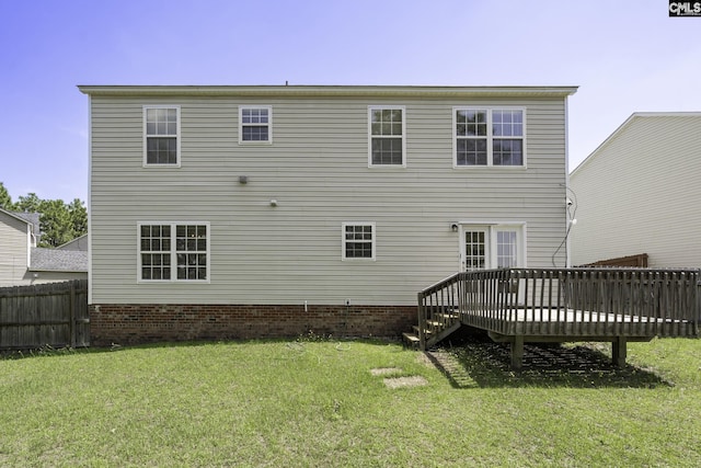 back of property with a deck