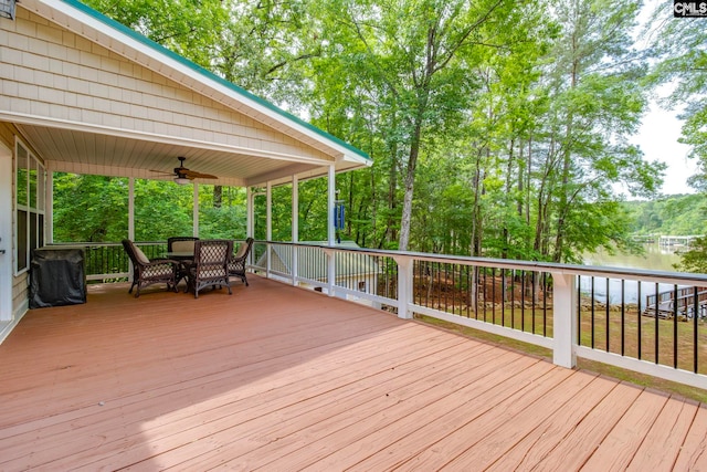 570 Wateree Key Ct, Winnsboro, SC 29180 - wooden deck with a ceiling fan and outdoor dining space