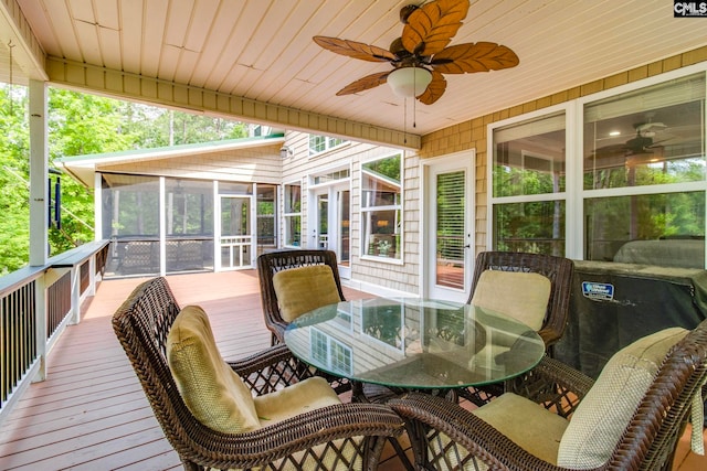 570 Wateree Key Ct, Winnsboro, SC 29180 - wooden deck featuring a sunroom, outdoor dining space, and a ceiling fan