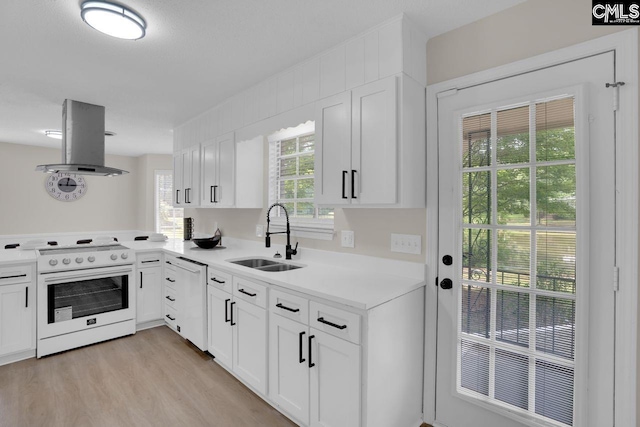 3102 Travis Ct, Columbia, SC 29204 - kitchen featuring white appliances, a sink, island range hood, light countertops, and white cabinets