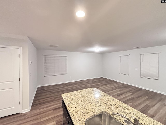 407 Eclipse Ln, Elgin, SC 29045 - finished below grade area featuring dark wood-style flooring, baseboards, and a sink