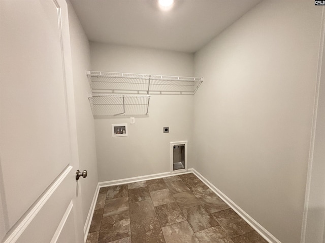 407 Eclipse Ln, Elgin, SC 29045 - washroom with hookup for a washing machine, electric dryer hookup, baseboards, and stone finish floors