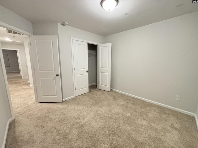 407 Eclipse Ln, Elgin, SC 29045 - unfurnished bedroom with light colored carpet, baseboards, and a closet