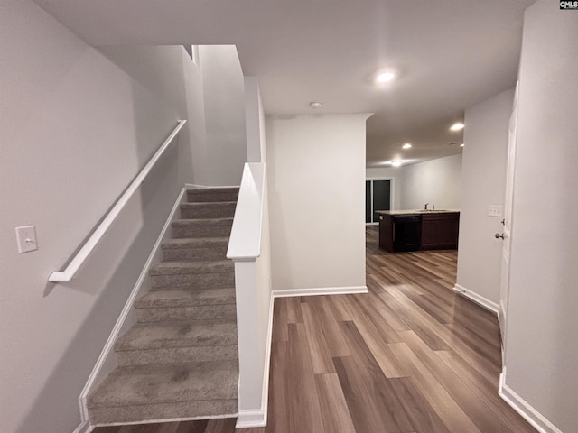 407 Eclipse Ln, Elgin, SC 29045 - stairway featuring wood finished floors, recessed lighting, and baseboards