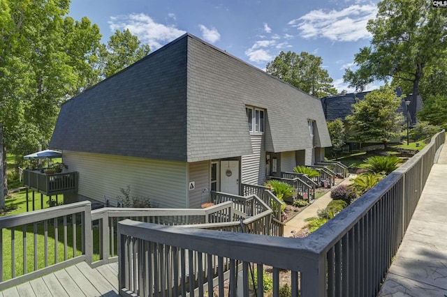 301 Harbor Heights Dr Unit 5D, Lexington, SC 29072 - view of front of home with roof with shingles and a wooden deck