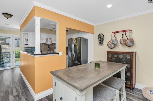 301 Harbor Heights Dr Unit 5D, Lexington, SC 29072 - kitchen featuring stainless steel refrigerator with ice dispenser, ornate columns, white cabinetry, dark wood finished floors, and ornamental molding
