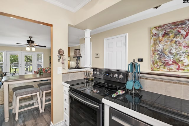 301 Harbor Heights Dr Unit 5D, Lexington, SC 29072 - kitchen featuring black / electric stove, a ceiling fan, ornamental molding, and wood finished floors