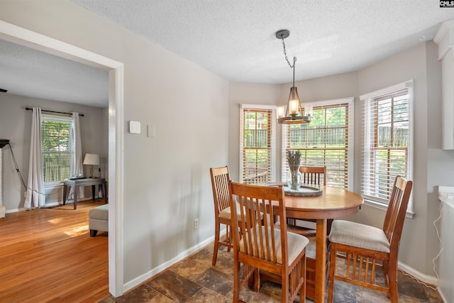 200 Kemsing Rd, Columbia, SC 29212 - dining area featuring baseboards and a textured ceiling