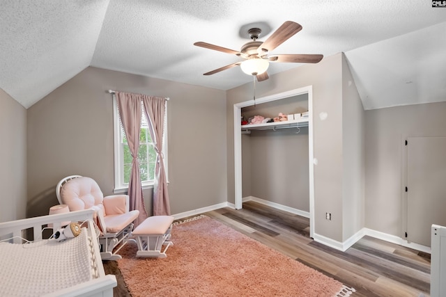200 Kemsing Rd, Columbia, SC 29212 - bedroom with wood finished floors, a closet, lofted ceiling, a textured ceiling, and ceiling fan