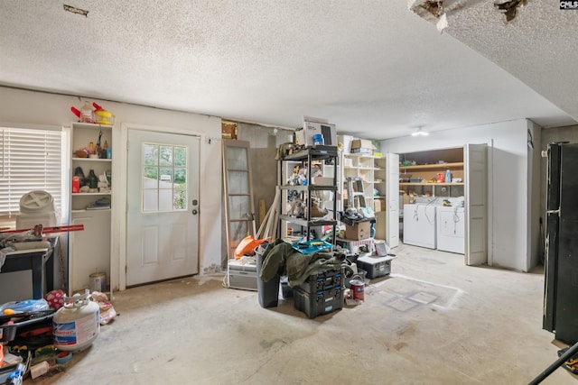200 Kemsing Rd, Columbia, SC 29212 - below grade area with a textured ceiling, separate washer and dryer, and freestanding refrigerator