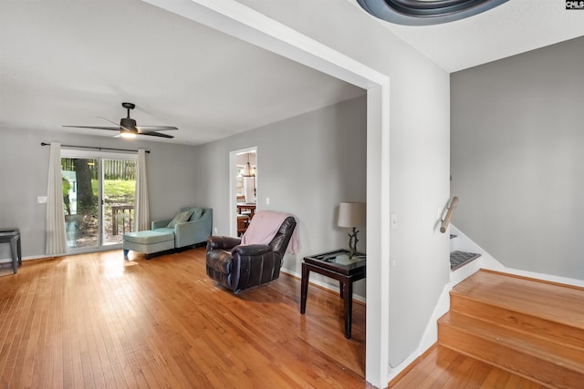 200 Kemsing Rd, Columbia, SC 29212 - living area featuring light wood-type flooring, a ceiling fan, stairway, and baseboards