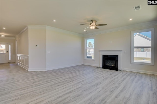 550 Edenwood Dr, Sumter, SC 29150 - unfurnished living room with crown molding, light wood-style flooring, a ceiling fan, plenty of natural light, and recessed lighting