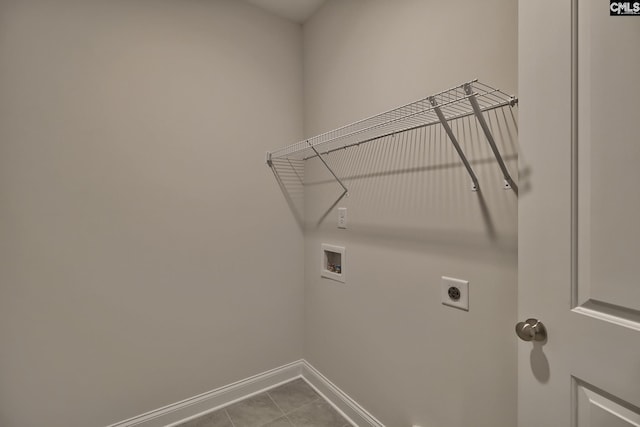 550 Edenwood Dr, Sumter, SC 29150 - washroom with hookup for a washing machine, baseboards, hookup for an electric dryer, and dark tile patterned floors