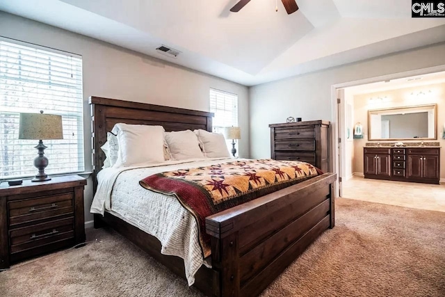 520 Connecticut Ave, Chapin, SC 29036 - bedroom featuring light carpet, vaulted ceiling, connected bathroom, and a ceiling fan
