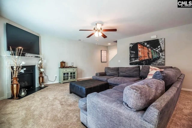 520 Connecticut Ave, Chapin, SC 29036 - living room with carpet flooring, ceiling fan, a fireplace with flush hearth, and baseboards
