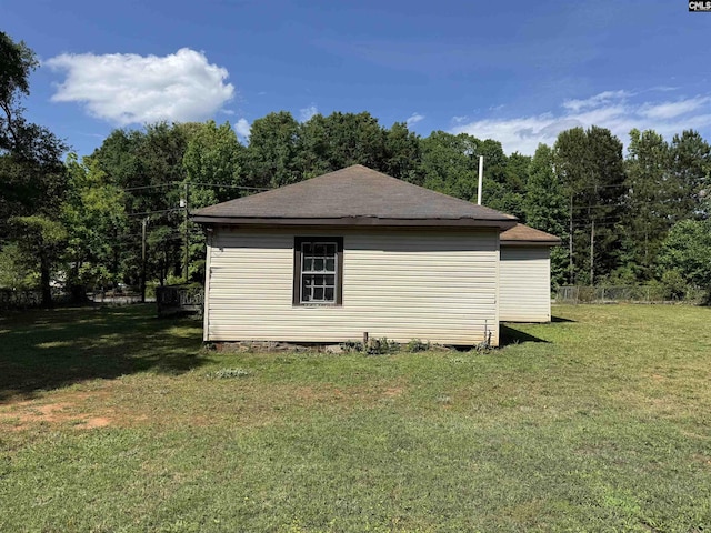 382 Fagan Rd, Winnsboro, SC 29180 - view of property exterior with a yard and a shingled roof