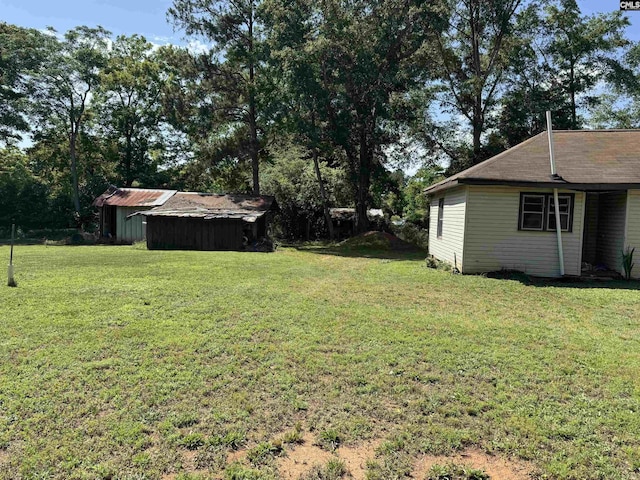 382 Fagan Rd, Winnsboro, SC 29180 - view of green lawn featuring an outbuilding
