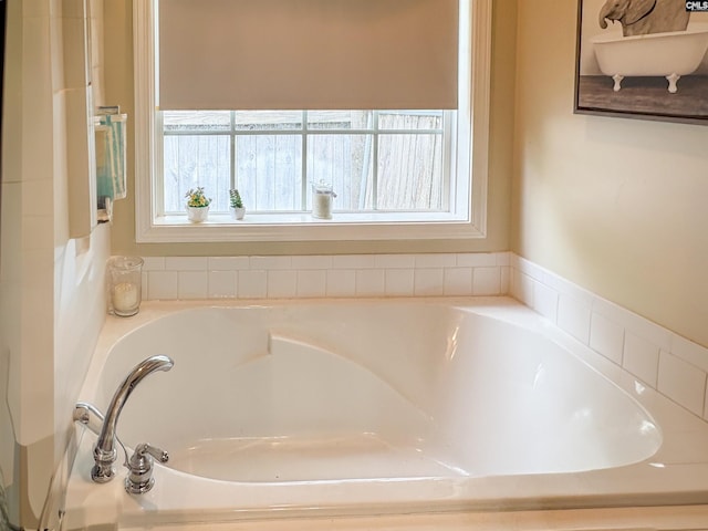 full bath featuring a bath
